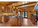 Gourmet kitchen features custom wood cabinets, stainless appliances, and a large center island at 6707 Frieden Church Rd, Gibsonville, NC 27249