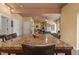Open living area with a granite table, a sofa and natural light at 6707 Frieden Church Rd, Gibsonville, NC 27249