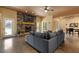 Comfortable living room with a stone fireplace, hardwood flooring, and recessed lighting at 6707 Frieden Church Rd, Gibsonville, NC 27249