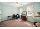 Comfortable bedroom with desk, dresser, and ample natural light at 7516 Orchard Crest Ct, Apex, NC 27539