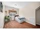 Neutral bedroom with a desk and a bed, perfect for relaxation and rest at 7516 Orchard Crest Ct, Apex, NC 27539
