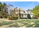 Stately two-story home with a well-manicured lawn and mature trees in a desirable neighborhood at 7516 Orchard Crest Ct, Apex, NC 27539