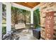 Relaxing front porch with a hanging swing, comfortable seating, and charming decor at 7516 Orchard Crest Ct, Apex, NC 27539