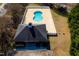 Aerial view of community pool and building; showcasing the recreational amenities at 7516 Orchard Crest Ct, Apex, NC 27539
