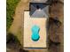 Overhead view of the fenced-in community pool with bath house amid bare trees at 7516 Orchard Crest Ct, Apex, NC 27539