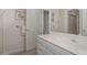 Bathroom features a bright vanity with white cabinets and a large mirror at 81008 Alexander, Chapel Hill, NC 27517