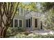 Charming home exterior featuring a second story balcony and a sunroom at 81008 Alexander, Chapel Hill, NC 27517