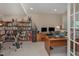 This home office features custom bookshelves, a large wooden desk, and direct access to the basement at 81008 Alexander, Chapel Hill, NC 27517