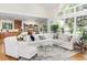 Inviting living room filled with natural light, comfortable seating, and stylish decor offers a perfect space for gatherings and relaxation at 81008 Alexander, Chapel Hill, NC 27517