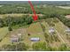 Wide aerial shot showing location of property relative to surrounding land at 8163 Julian Rd, Dunn, NC 28334