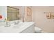 Cozy bathroom with simple decor, a single sink, and tile backsplash at 10011 Hammock Bnd, Chapel Hill, NC 27517