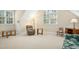 Spacious bonus room with neutral carpet, natural light and versatile layout at 10011 Hammock Bnd, Chapel Hill, NC 27517