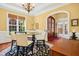 Bright dining room with table, chairs, and large window offers a charming atmosphere at 10011 Hammock Bnd, Chapel Hill, NC 27517