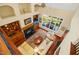 Spacious living room with fireplace and plenty of natural light at 10011 Hammock Bnd, Chapel Hill, NC 27517