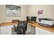 Bright office space with built-in desk and storage, perfect for a productive work environment at 10011 Hammock Bnd, Chapel Hill, NC 27517