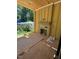 Outdoor patio featuring a fireplace and views of the fenced-in backyard at 1002 Canterbury Rd, Raleigh, NC 27607