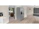 Spacious kitchen with stainless steel fridge and hardwood floors at 109 N Valley Dr, Louisburg, NC 27549