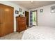 Charming bedroom features natural light and classic wood furniture at 112 Cameron Ct, Cary, NC 27511