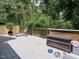 Spacious deck offers serene spot with a lounge chair and additional seating for outdoor enjoyment at 112 Cameron Ct, Cary, NC 27511