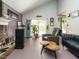 Spacious living room featuring sliding glass doors leading to the outdoors at 112 Cameron Ct, Cary, NC 27511