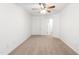 Neutral bedroom with a large closet and a window overlooking the yard at 11710 Mezzanine Dr # 101, Raleigh, NC 27614