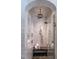 This shower features a rainfall shower head, a glass door, white tile, and a built-in seat at 1222 Duplin Rd, Raleigh, NC 27607