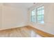Bright living room with wood floors and natural light at 124 Owensboro Ct, Raleigh, NC 27603