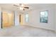 Spacious main bedroom with neutral carpet and natural light at 124 Owensboro Ct, Raleigh, NC 27603