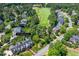 Aerial view of a property adjacent to a golf course, marked as 129 Trollingwood Dr at 129 Trellingwood Dr, Morrisville, NC 27560