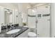 Modern bathroom featuring a glass shower, granite counters, and a neutral color scheme that enhances relaxation at 129 Trellingwood Dr, Morrisville, NC 27560
