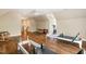 Large bonus room with hardwood floors, and natural light offering space for a variety of recreational activities at 129 Trellingwood Dr, Morrisville, NC 27560