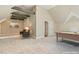 This flexible game room features a billiard table and comfortable seating at 129 Trellingwood Dr, Morrisville, NC 27560