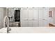 Kitchen showcases a stainless steel refrigerator and ample cabinet space at 129 Trellingwood Dr, Morrisville, NC 27560