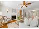 The living room features a fireplace, built-in shelving, and neutral decor, creating a comfortable atmosphere at 129 Trellingwood Dr, Morrisville, NC 27560