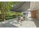 Relax on this covered patio with a retractable awning, ideal for outdoor enjoyment at 129 Trellingwood Dr, Morrisville, NC 27560