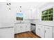 Bright kitchen showcasing granite counters, stainless steel dishwasher, and updated fixtures at 1415 Clearwater Dr, Sanford, NC 27330