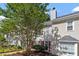 Exterior of charming townhome featuring a landscaped yard at 1442 Aversboro Rd # 7, Garner, NC 27529