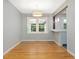 Dining area featuring hardwood floors, pendant lighting and a bright window at 1521 N Duke St, Durham, NC 27701