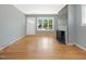 Open floor plan featuring hardwood floors and a fireplace at 1521 N Duke St, Durham, NC 27701