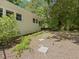 Landscaped yard with a stone pathway that leads through a mulched garden area at 1521 N Duke St, Durham, NC 27701
