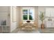 Cozy dining room with table, seating for four, and lots of natural light at 1581 Goldfinch Perch Ln, Knightdale, NC 27545