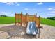 Playground slide offers the the thrill of going down a sloped structure at 1581 Goldfinch Perch Ln, Knightdale, NC 27545