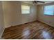 Bedroom with a ceiling fan and wood flooring at 167 Chic Ennis Rd, Coats, NC 27521