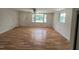 Spacious living room with a ceiling fan and lots of natural light at 167 Chic Ennis Rd, Coats, NC 27521