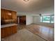 Open layout features a kitchen with cabinets and hardwood floors throughout at 167 Chic Ennis Rd, Coats, NC 27521
