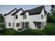 Stunning exterior view of a modern home featuring a screened-in sunroom and patio at 1800 Pershing Rd, Raleigh, NC 27608