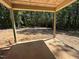 Covered back porch leading to a wooded lot at 188 Landon Ridge, Sanford, NC 27330