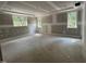 Bright bedroom with tray ceiling, large windows, and recessed lighting at 188 Landon Ridge, Sanford, NC 27330