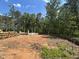 Image of newly poured foundation ready for framing with lumber on site at 188 Landon Ridge, Sanford, NC 27330
