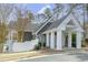 Exterior view of a dark green building with a porte-cochere at 1933 Castle Pines Dr, Raleigh, NC 27604